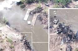  На березі річки Сіверський Донець після нападу в неділю можна було побачити зруйнований понтонний міст та обвуглені залишки транспортних засобів 