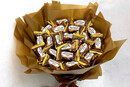 Букети з цукерок «Пригощайся»: як їх зробити та де придбати цукерки для букета?