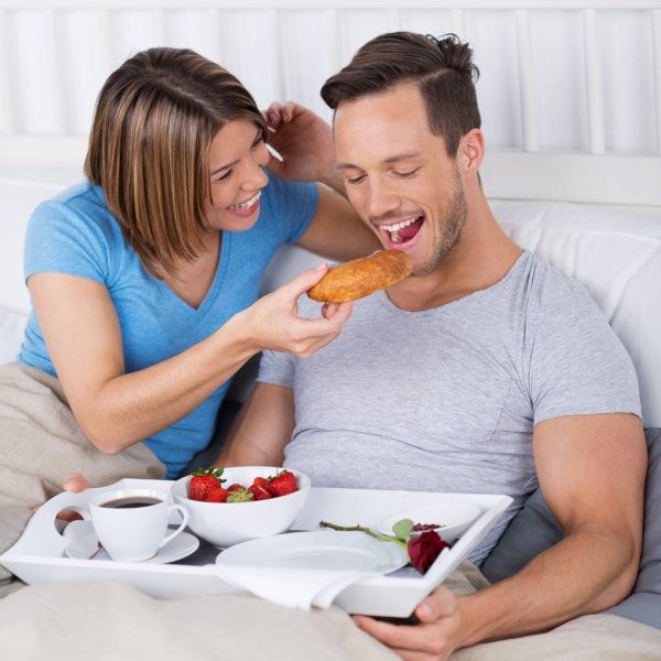 depositphotos_26807471-stock-photo-laughing-couple-enjoying-breakfast-in